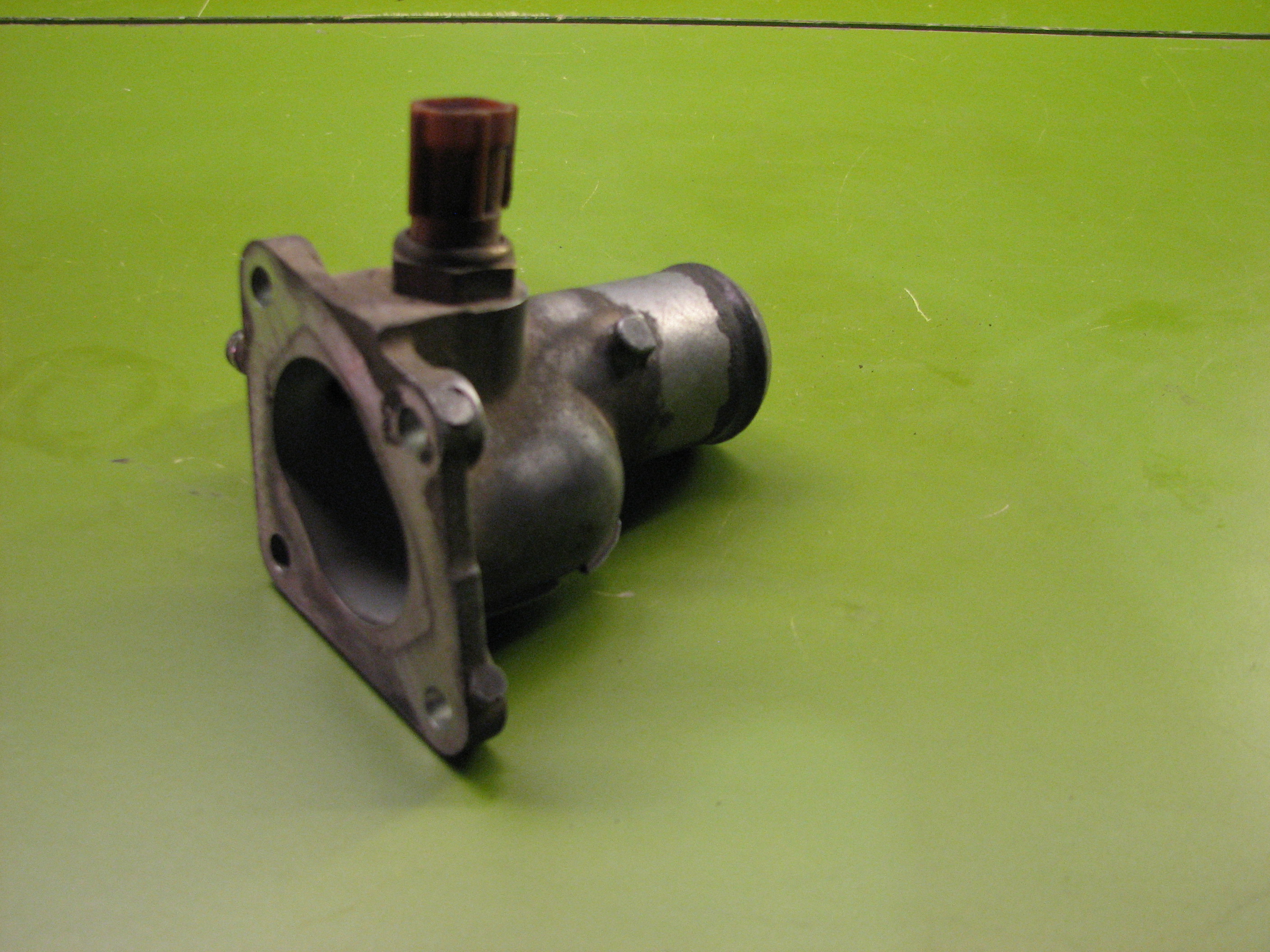 حوزینگ خروجی آب سرسیلندر ویتارا 2400